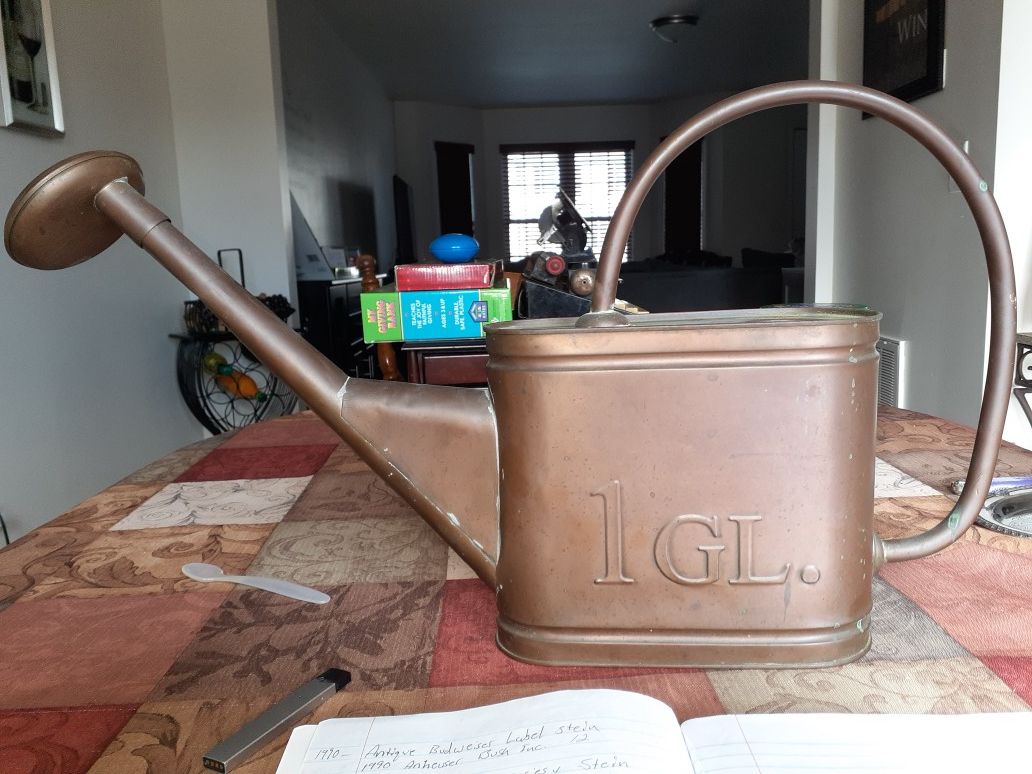 Vintage oval copper watering can embossed