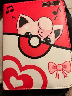 Cute Pokemon binder with some holo cards and ex