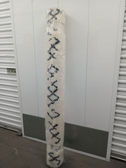 NEW AREA RUG