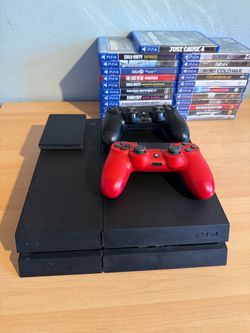 PS4 with 24 games and two controllers working condition