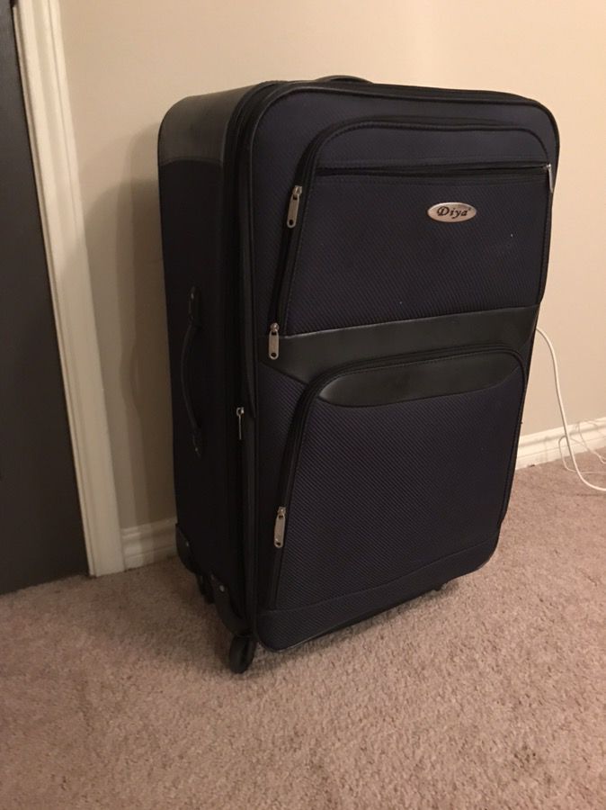 Like new- Large suitcase