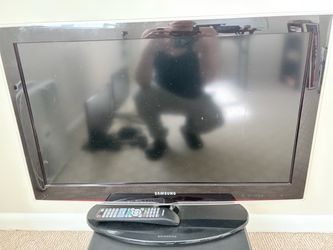 Two used flat screen TVs and 1 computer monitor