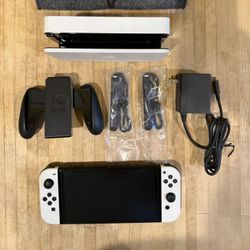 Nintendo Switch OLED (White) – Original Accessories + Carrying Case