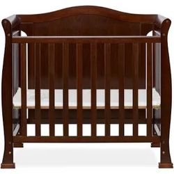 Brown Baby Crib Used ,also A Bassinet.used