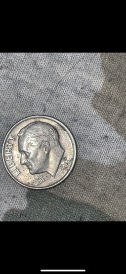 4 different coins P-1979 one dollar coin, D-1980 on dollar coin, P-2003 Dime, D-1988 dime