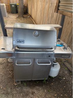 Weber 3 burner with side burner  propane