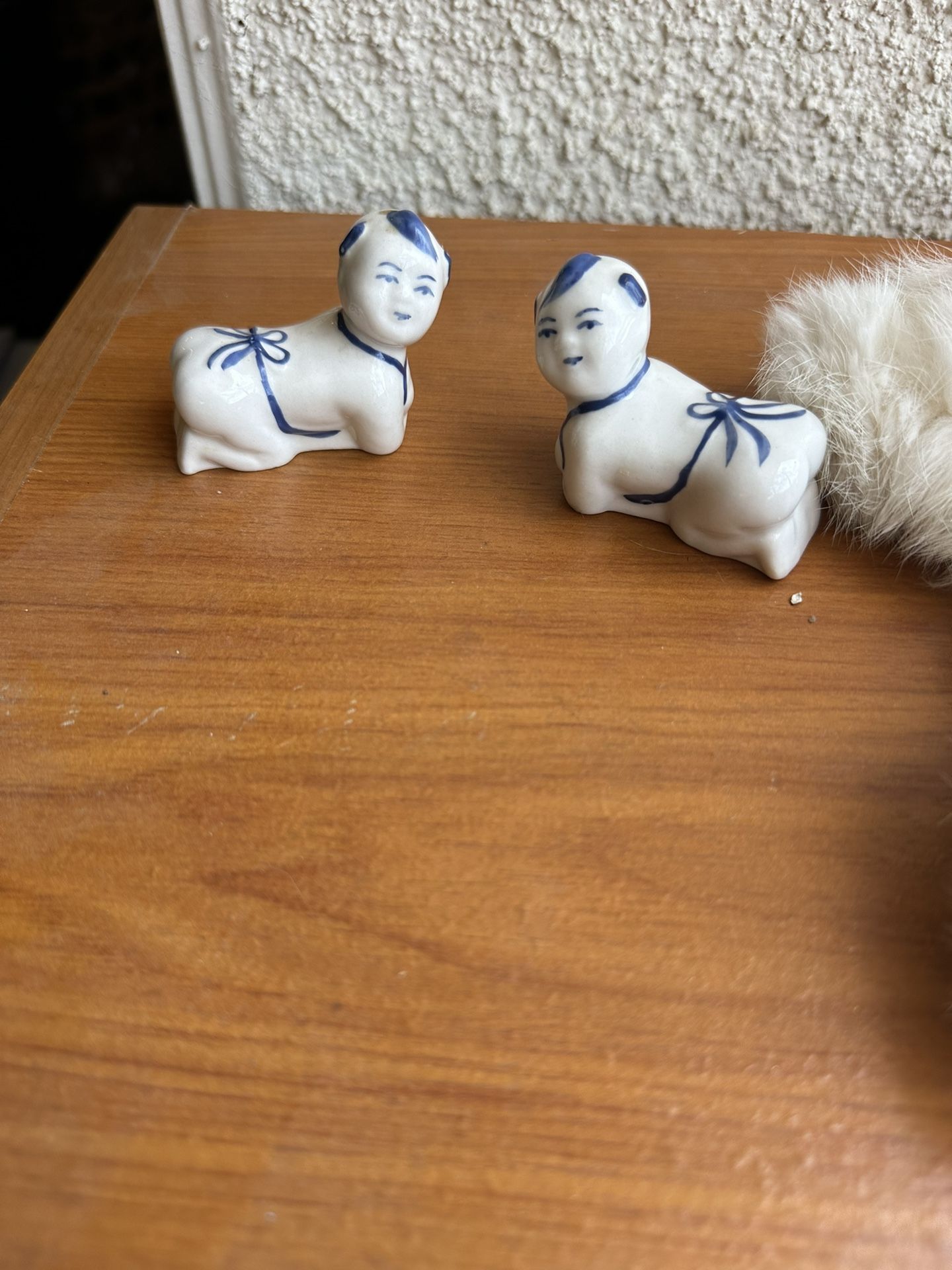 vintage-style Chinese porcelain figures, commonly known as "Pillow Babies"