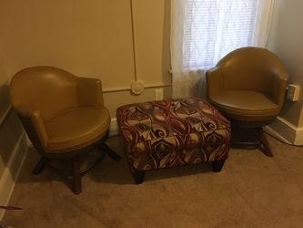Leather barrel swivel Chairs and ottoman