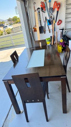 Used a brown dinning table with 6 chairs