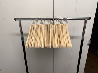 Wooden clothes hangers (33 hangers) $25obo