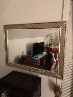 Photo Very nice mirror frame is silver it is a beveled mirror very heavy and Weight! Pick up is in Carroll.