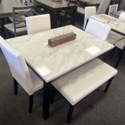 Dining Room Table With White Marble Table Top With Leather Chairs 