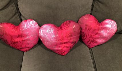 Three decorative pillows.