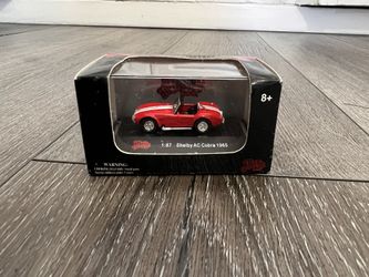 Malibu International 1/87 Scale tiny car Shelby AC red with White Stripes Brand New !