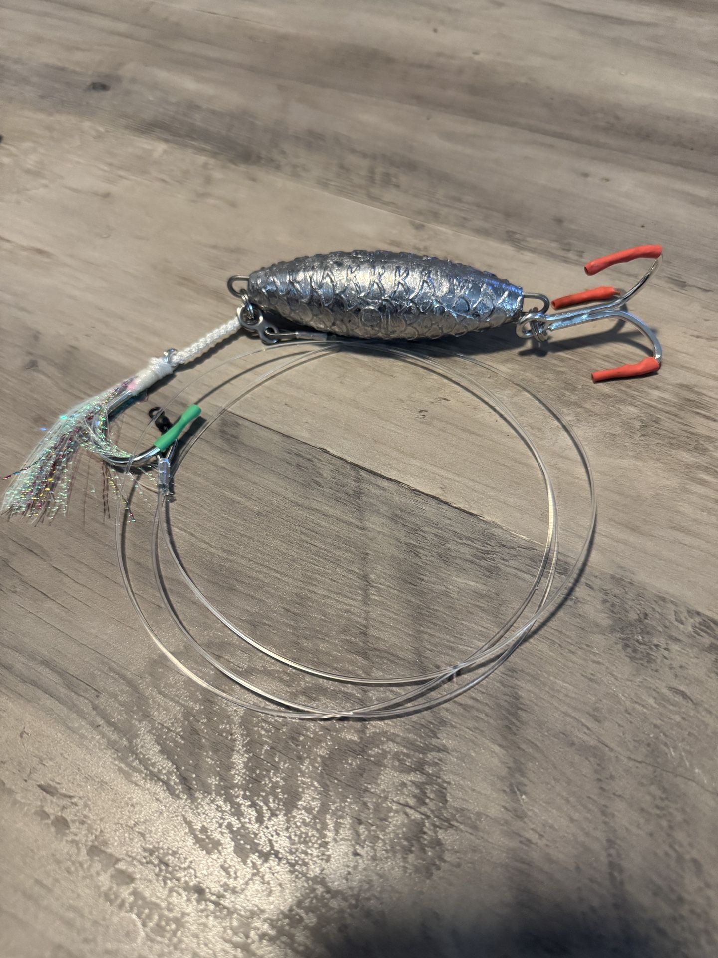 Eddie Tuna Fishing Jigs Brand New With All High End Hooks Feather Rings And Line.