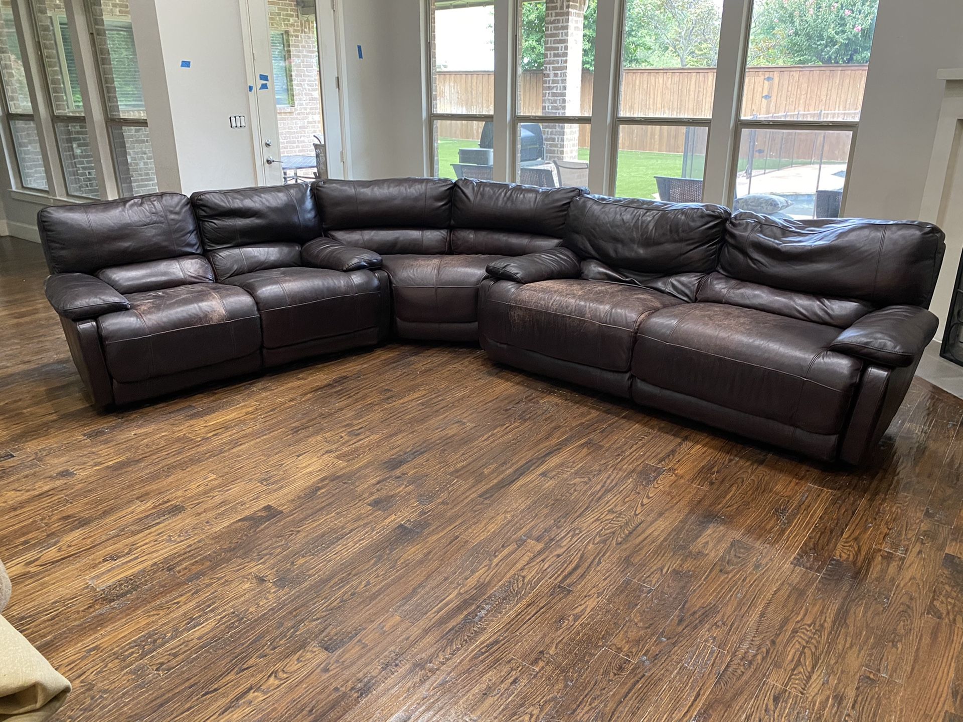 SOLD PENDING PICK UP - Three piece leather sectional sofa with auto reclining