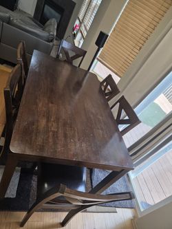 Wooden Dining table with 6 chairs