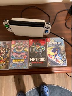 Nintendo Switch OLED Bundle – 7 Games, Joy-Cons, Dock & Mario Case