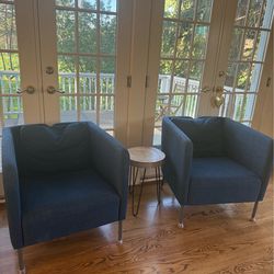 Two blue ikea chairs