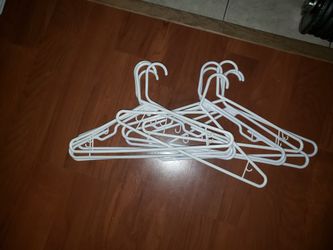 4 Sets of 10 White Plastic Clothing Hangers $5/each