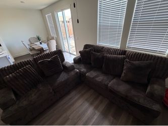 Brown plush sofa and loveseat