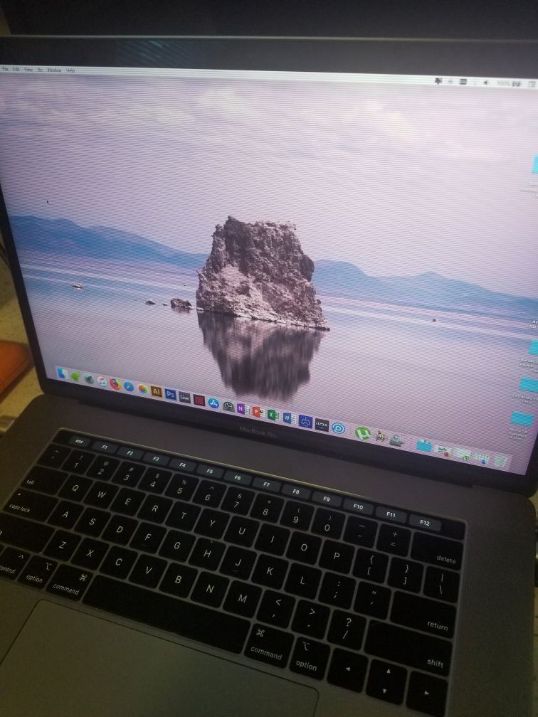 Apple Macbook Pro w/ Touch Bar (mid 2018)