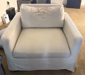 White slipcover arm chair