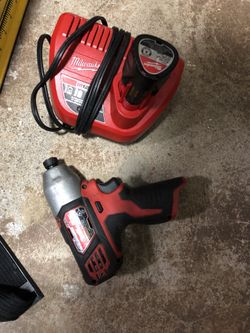 Milwaukee impact, battery and charger