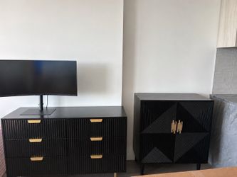Black dresser and cabinet
