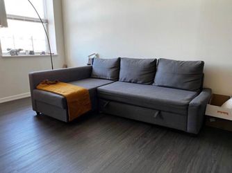 Gray Friheten 90” Queen Sleeper Sectional Sofa with Reversible Storage Chaise