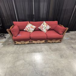 French Provincial Style Red Couch with Carved Wood