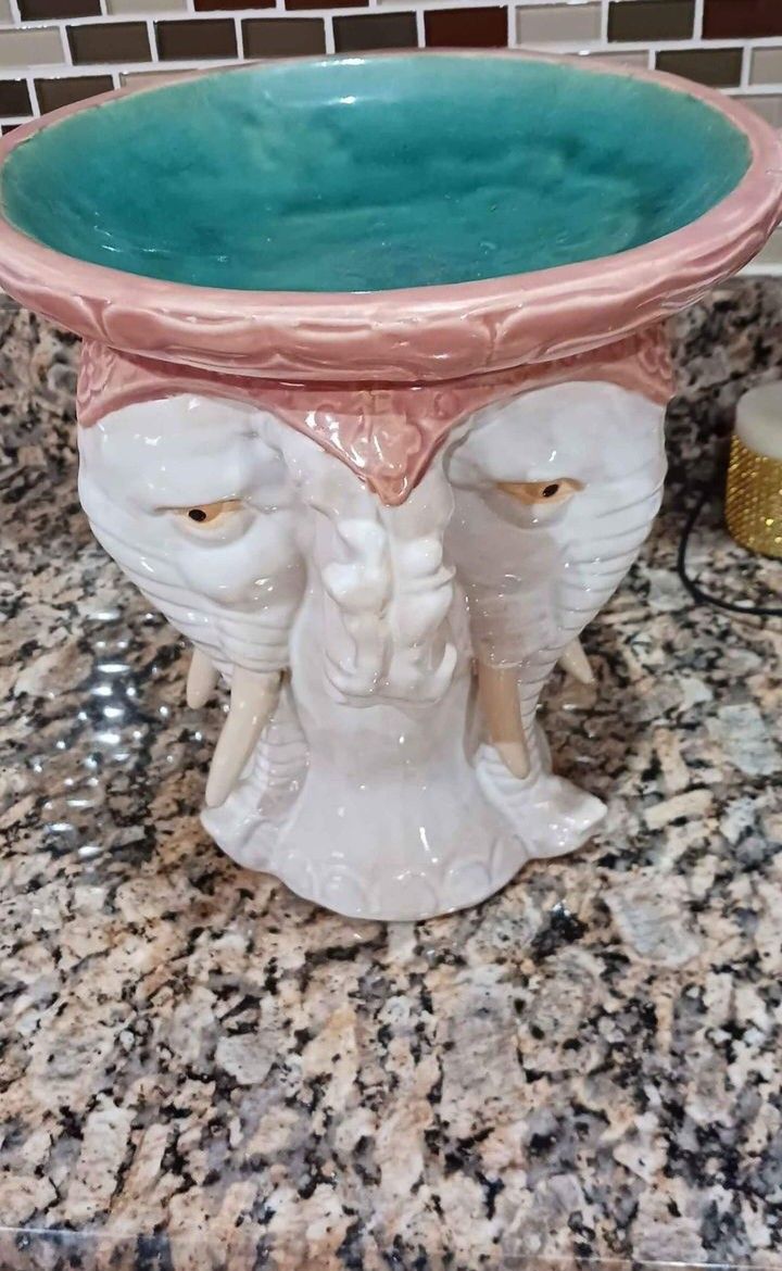 Nice Elephant decoration. I use as a plant stand Indoor or you can Use It for What Ever