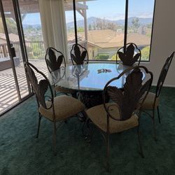 The set includes 1 table and  6 chairs.