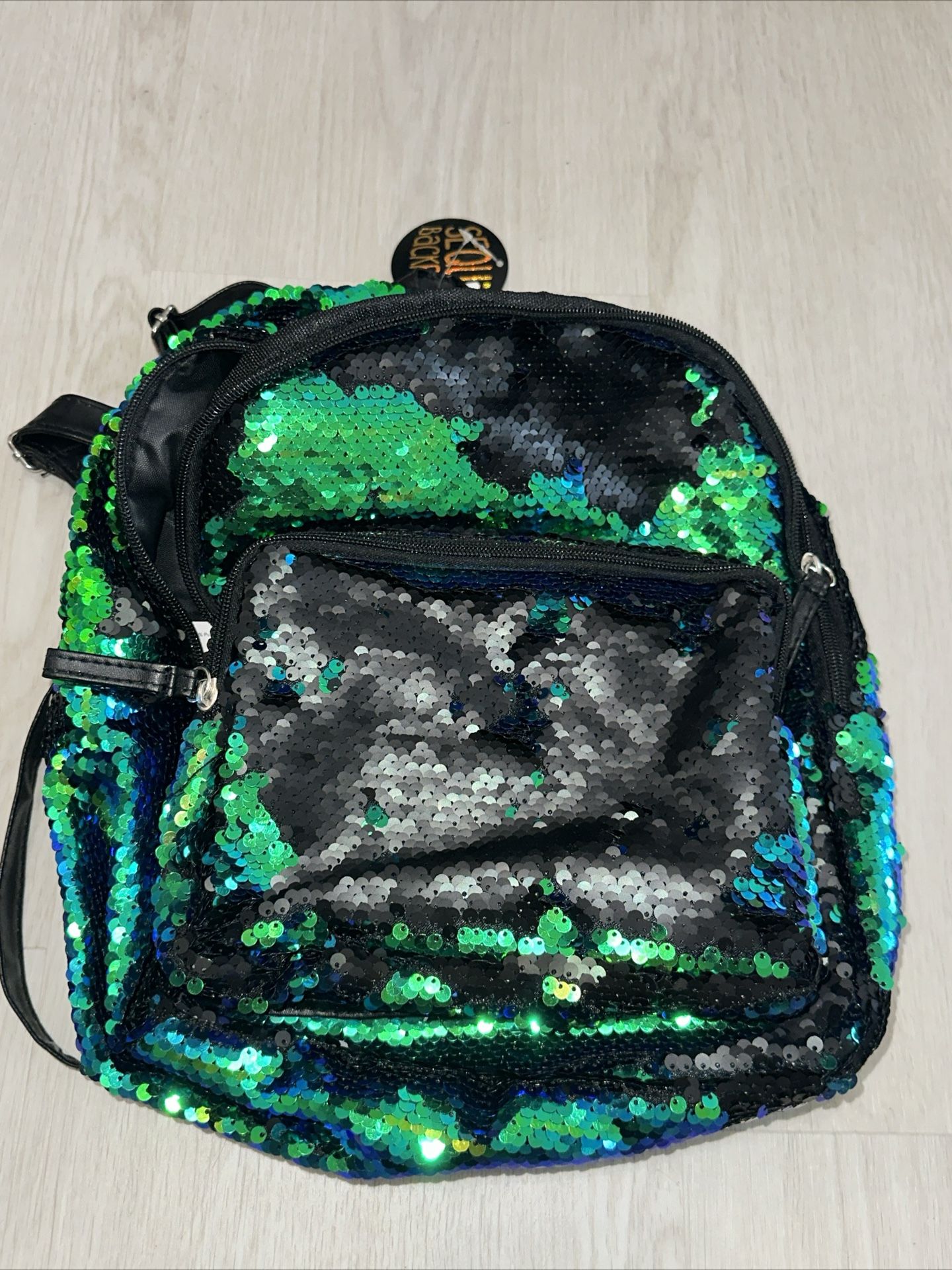 DAVE AND BUSTERS sequin Green Blue backpack brand new (broken Strap)