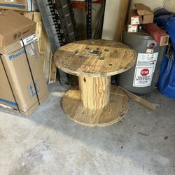 $50 for a wooden wire reel for a outside table