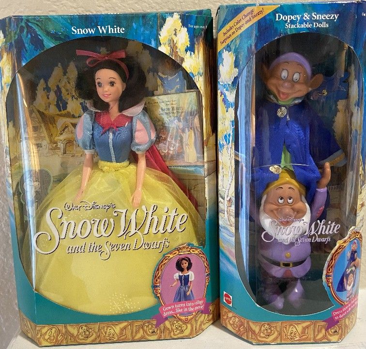 Snow White Barbie And
Dopey and Sneezy