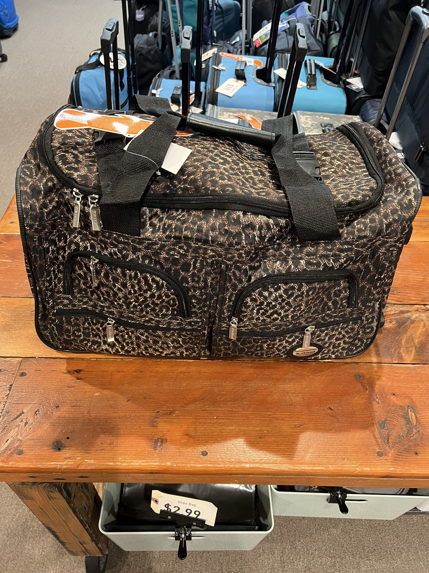 Leopard Print 22” Rolling Duffle Bag with Shoulder Strap