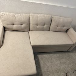 Beige Couch with Chaise & Pull Out Bed