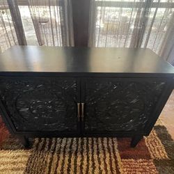 dark blue carved cabinet 