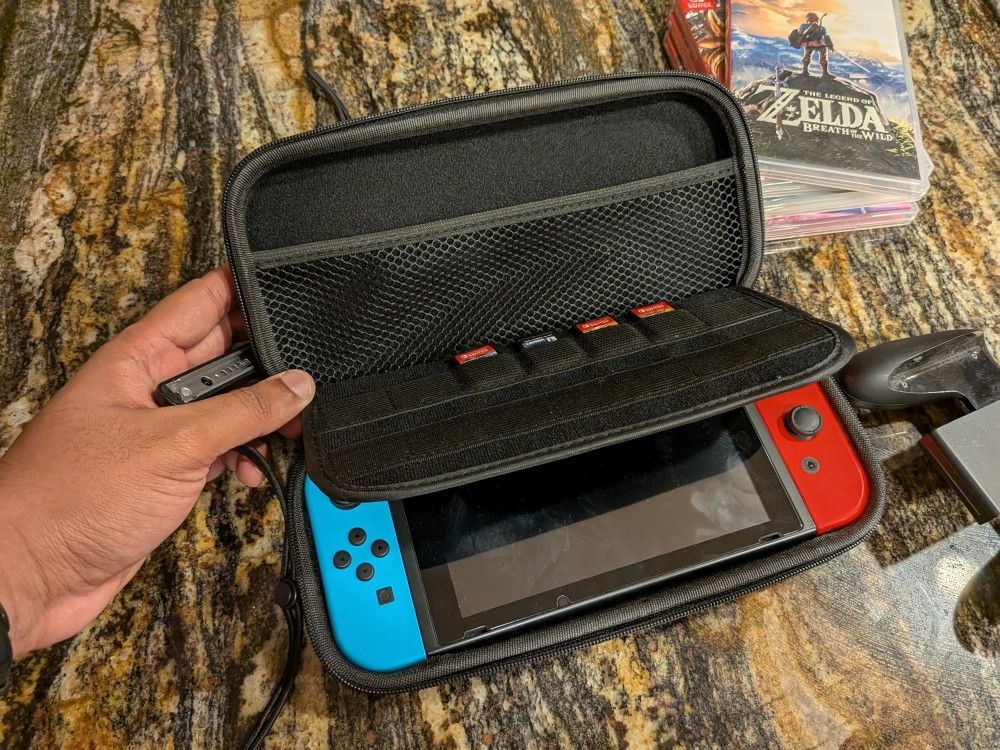 Nintendo Switch And 4 Games