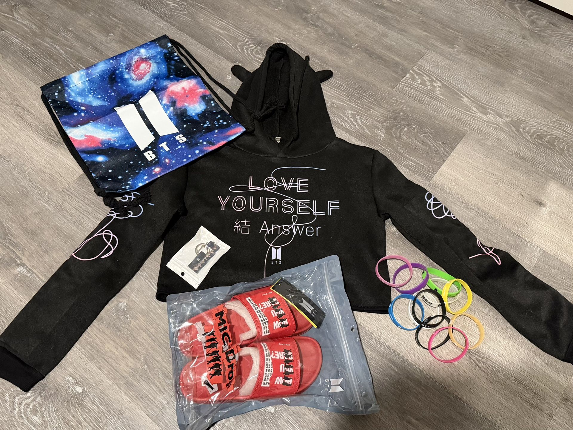 B.T.S. Korean K-Pop Bundle Deal (Size Small Crop Top Sweater) (Size 5 Slides) Key Chain And Lots Of Wrist Band