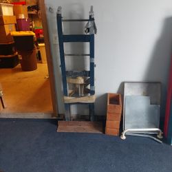 Hand truck with straps for moving heavy appliances