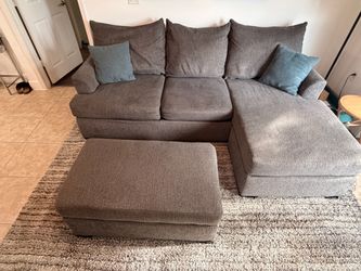 Gray Sectional Sofa with Storage Ottoman and Area Rug