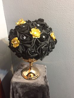 Black and gold table centerpiece