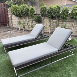 Two Caluco Lounge Chairs
