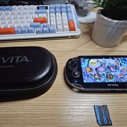 PS Vita 1000 oled 128GB With Games And Charger