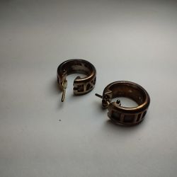A pair of Silver Tiffany & Co 'Atlas' hoop earrings