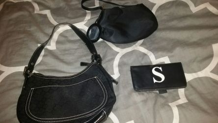 Black purses and checkbook