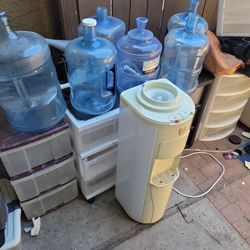 Water Cooler And 6 Jugs