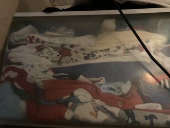 Box of assorted used baby boy clothes